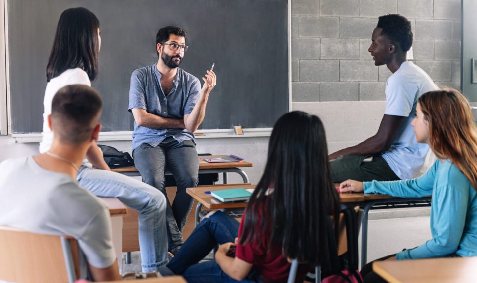 Teenager student class and young teacher sharing group discussion at High School - Education MentalHealth Support